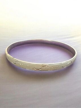 Silver-Tone Swirl Engraved Bangle Bracelet
916